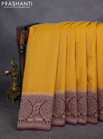 Pure Banarasi georgette saree mustard yellow and wine shade with allover woven buttas and woven border