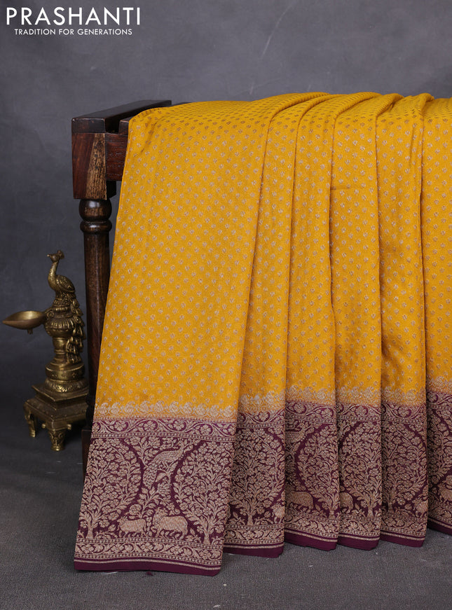 Pure Banarasi georgette saree mustard yellow and wine shade with allover woven buttas and woven border