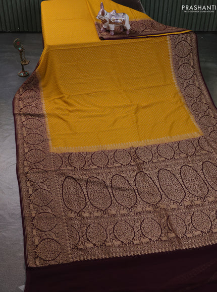 Pure Banarasi georgette saree mustard yellow and wine shade with allover woven buttas and woven border