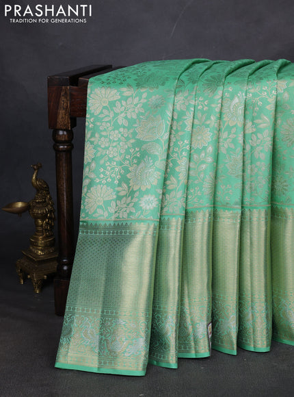 Pure kanchipuram silk saree teal green with allover zari woven brocade weaves and long zari woven border