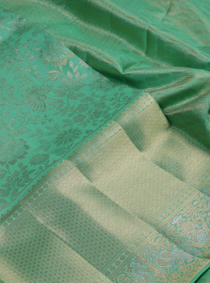 Pure kanchipuram silk saree teal green with allover zari woven brocade weaves and long zari woven border