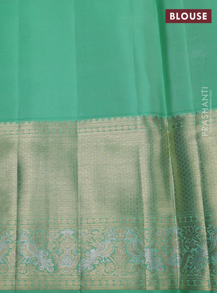 Pure kanchipuram silk saree teal green with allover zari woven brocade weaves and long zari woven border