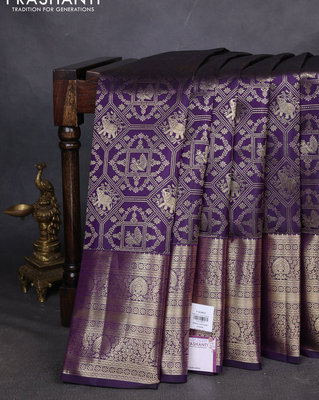 Pure kanchipuram silk saree deep violet with allover zari woven brocade weaves and long zari woven border