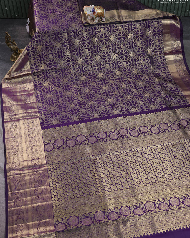 Pure kanchipuram silk saree deep violet with allover zari woven brocade weaves and long zari woven border