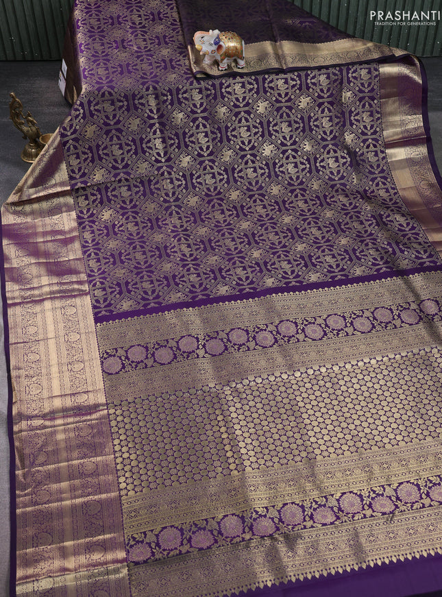 Pure kanchipuram silk saree deep violet with allover zari woven brocade weaves and long zari woven border