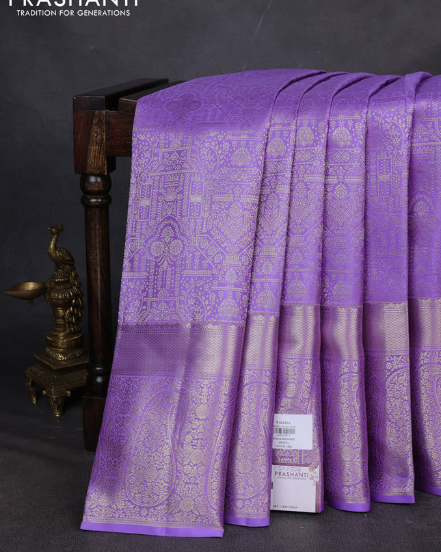 Pure kanchipuram silk saree lavender with allover zari woven brocade weaves and zari woven border