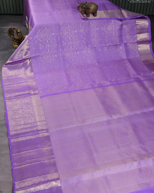 Pure kanchipuram silk saree lavender with allover zari woven brocade weaves and zari woven border