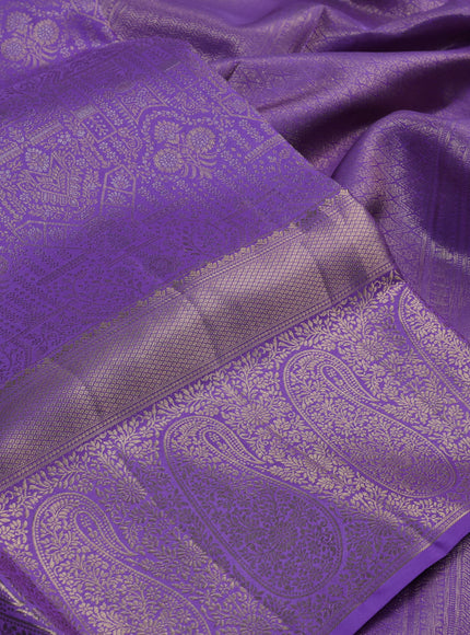Pure kanchipuram silk saree lavender with allover zari woven brocade weaves and zari woven border