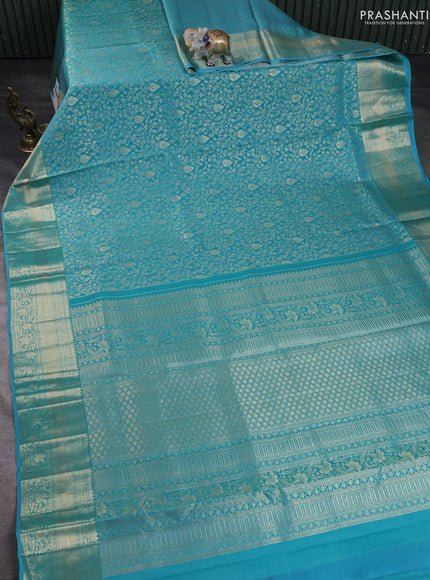 Pure kanchipuram silk saree teal blue with allover zari woven brocade weaves and zari woven border