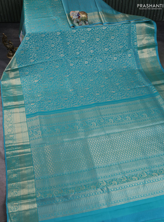 Pure kanchipuram silk saree teal blue with allover zari woven brocade weaves and zari woven border