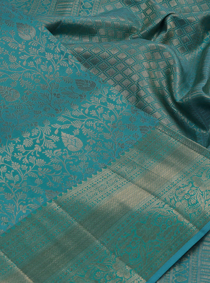 Pure kanchipuram silk saree teal blue with allover zari woven brocade weaves and zari woven border