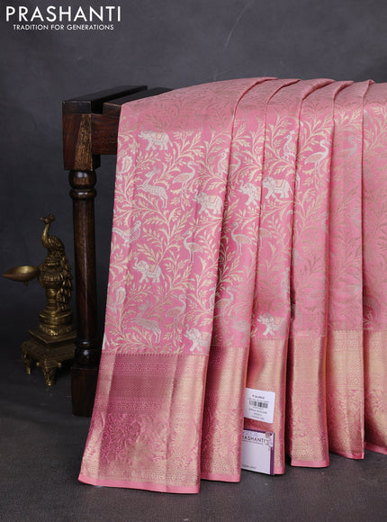 Pure kanchipuram silk saree peach pink with allover zari woven brocade weaves and zari woven border