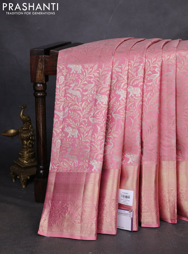 Pure kanchipuram silk saree peach pink with allover zari woven brocade weaves and zari woven border