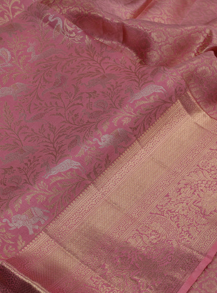 Pure kanchipuram silk saree peach pink with allover zari woven brocade weaves and zari woven border