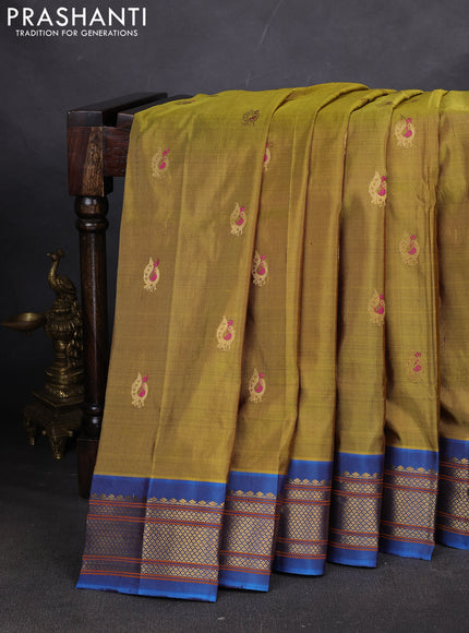 Pure paithani silk saree mehendi green and cs blue with annam zari woven buttas and paithani weaving pallu