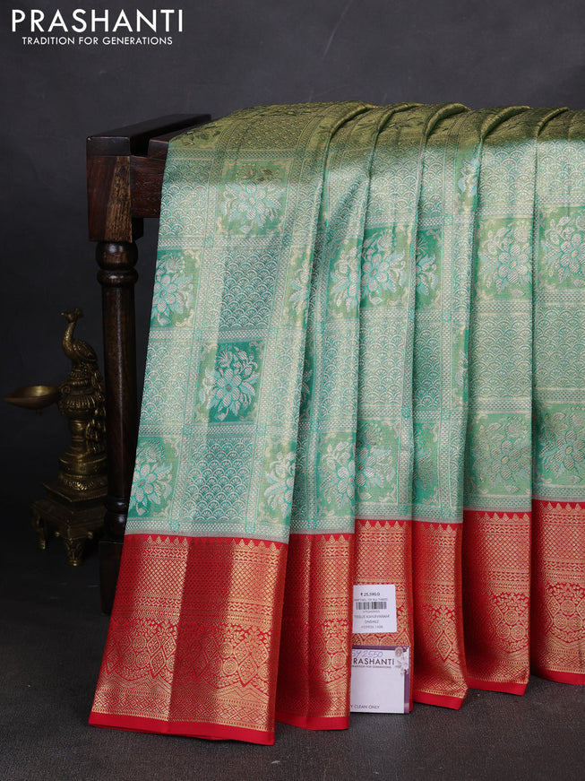 Pure kanchipuram silk saree teal green and red with allover zari woven brocade weaves and zari woven border