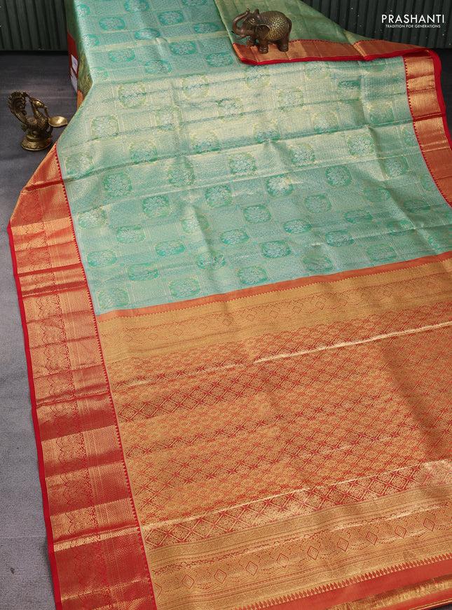 Pure kanchipuram silk saree teal green and red with allover zari woven brocade weaves and zari woven border
