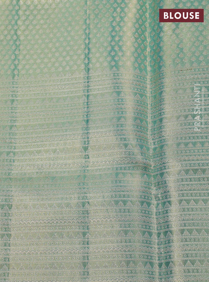 Pure kanchipuram silk saree lilac and golden teal with allover zari woven brocade weaves and long zari woven floral motif border