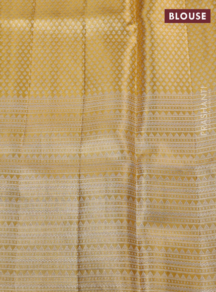 Pure kanchipuram silk saree gold and golden red with allover zari woven brocade weaves and long zari woven floral motif border