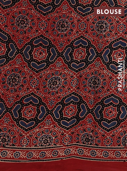 Modal silk Saree rustic orange with allover ajrakh butta prints and printed border