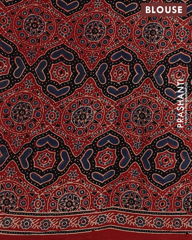Modal silk Saree rustic orange with allover ajrakh butta prints and printed border