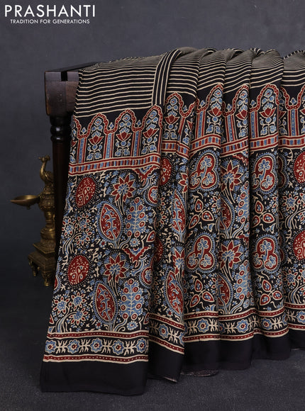 Modal silk Saree black with allover geometric prints and long ajrakh printed border