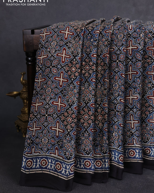 Modal silk Saree black and indigo blue with allover ajrakh prints and printed border