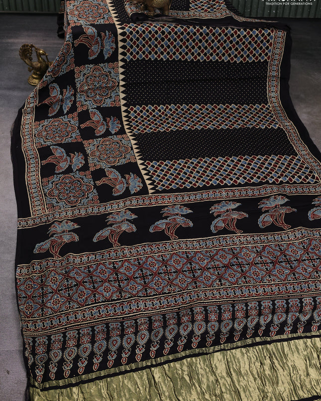 Modal silk Saree black with allover ajrakh prints and printed border