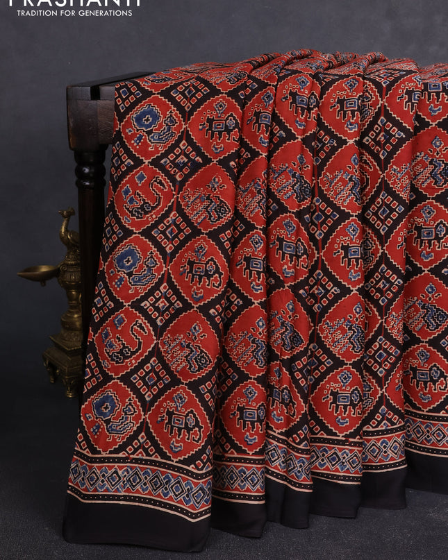 Modal silk Saree black and maroon with allover ajrakh prints and printed border