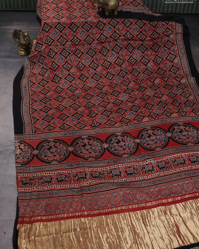 Modal silk Saree black and maroon with allover ajrakh prints and printed border