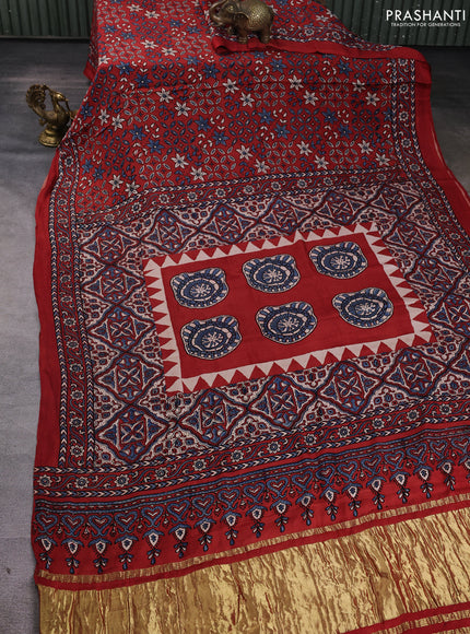 Modal silk Saree maroon with allover ajrakh prints and printed border