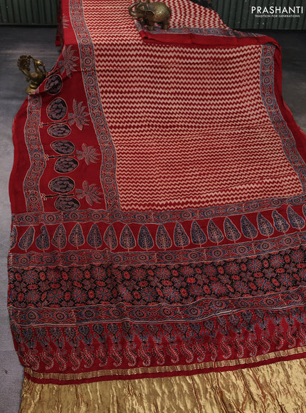Modal silk Saree beige and maroon with allover zig zag prints and ajrakh printed border