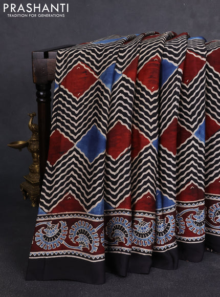 Modal silk Saree black and maroon with allover zig zag prints and ajrakh printed border