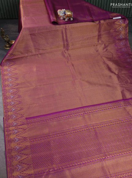 Pure kanchipuram silk saree purple with allover zari woven brocade weaves and temple design zari woven border