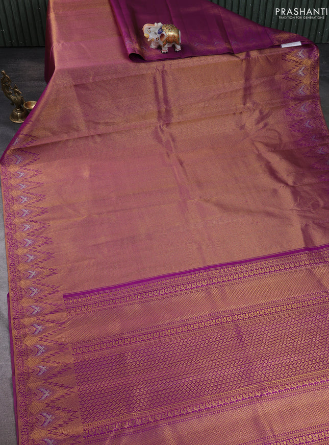 Pure kanchipuram silk saree purple with allover zari woven brocade weaves and temple design zari woven border