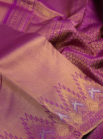 Pure kanchipuram silk saree purple with allover zari woven brocade weaves and temple design zari woven border