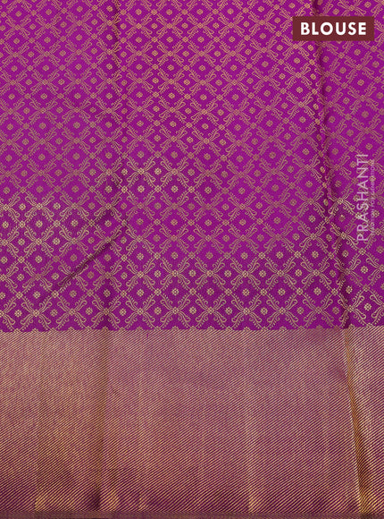 Pure kanchipuram silk saree purple with allover zari woven brocade weaves and temple design zari woven border