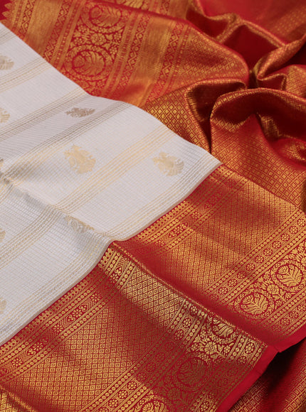 Pure kanchipuram silk saree cream and red with allover zari checks & butta weaves and rich zari woven border