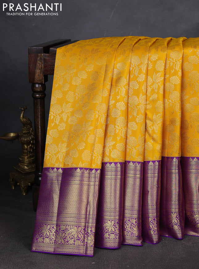 Pure kanchipuram silk saree mango yellow and violet with allover zari woven brocade weaves and long zari woven border
