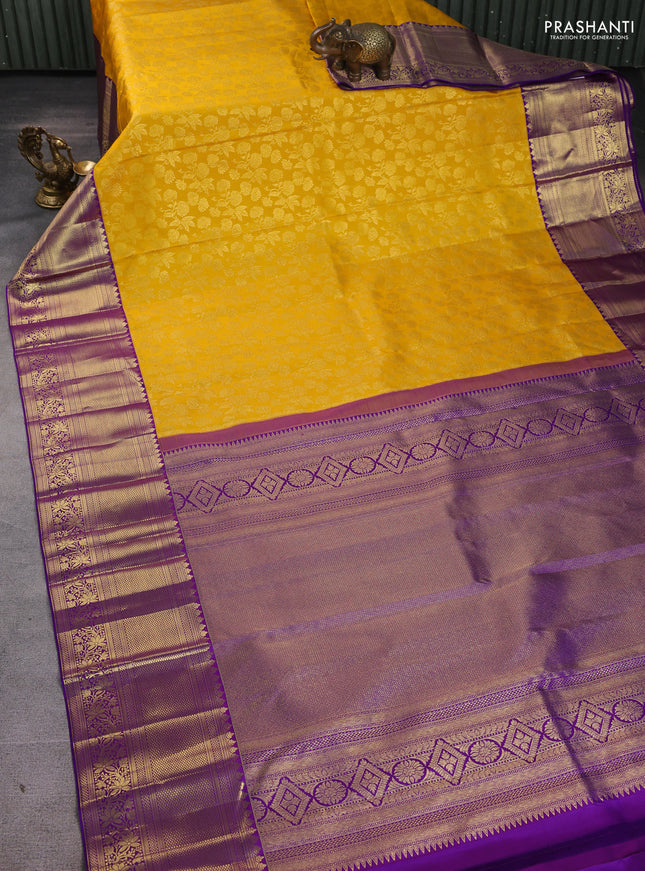 Pure kanchipuram silk saree mango yellow and violet with allover zari woven brocade weaves and long zari woven border