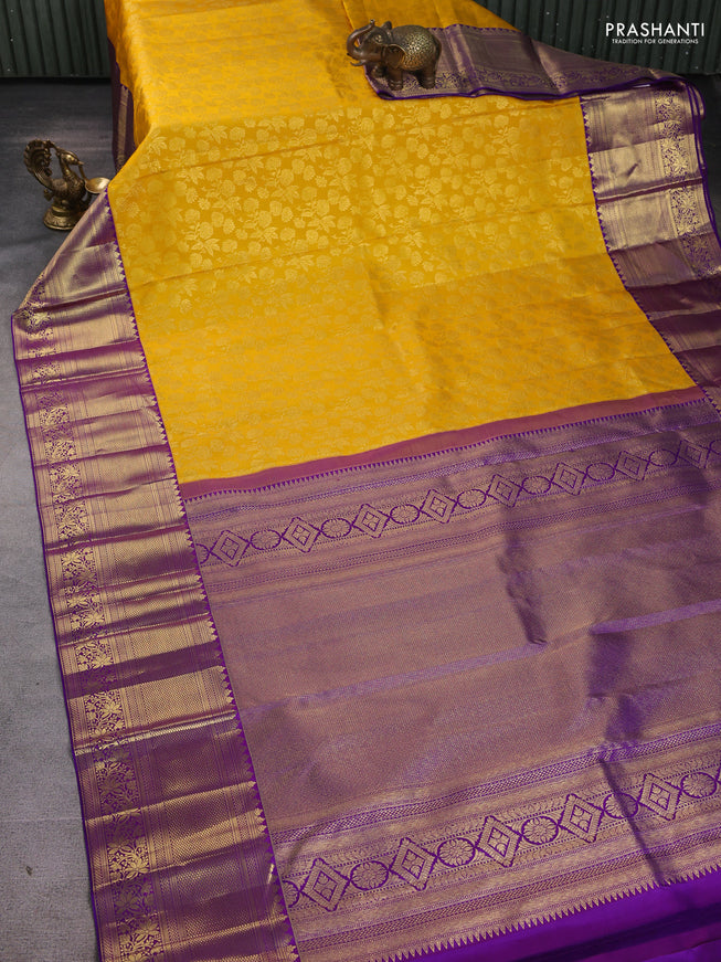 Pure kanchipuram silk saree mango yellow and violet with allover zari woven brocade weaves and long zari woven border