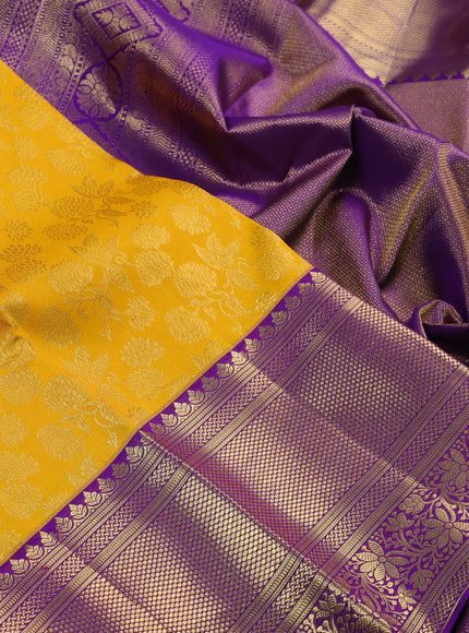 Pure kanchipuram silk saree mango yellow and violet with allover zari woven brocade weaves and long zari woven border