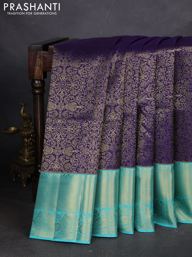 Pure kanchipuram silk saree blue and teal blue with allover zari woven brocade weaves and long zari woven border