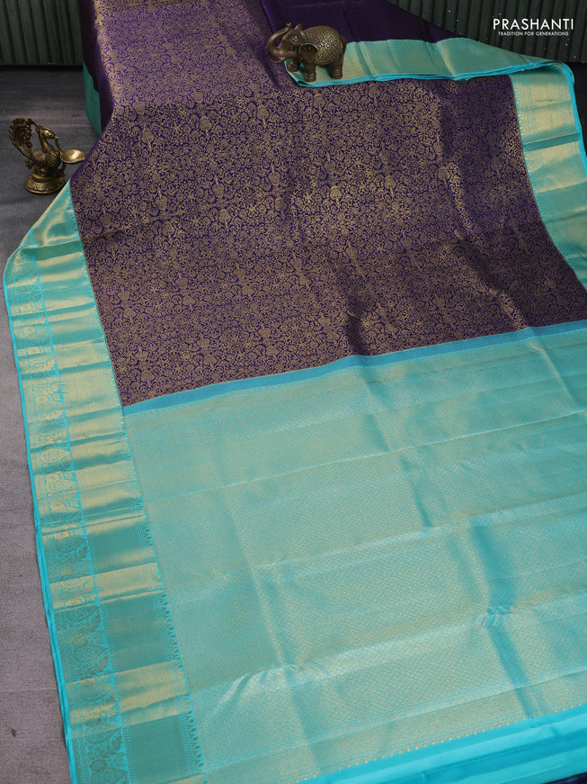 Pure kanchipuram silk saree blue and teal blue with allover zari woven brocade weaves and long zari woven border