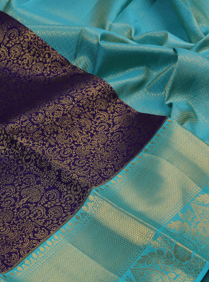 Pure kanchipuram silk saree blue and teal blue with allover zari woven brocade weaves and long zari woven border