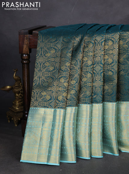 Pure kanchipuram silk saree peacock green and light blue with allover zari woven brocade weaves and long zari woven border