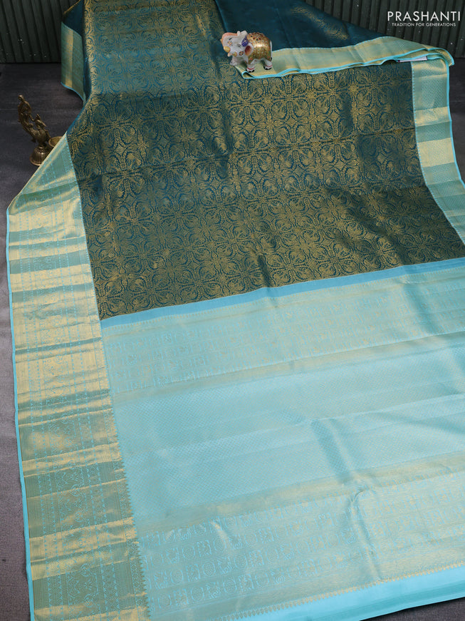Pure kanchipuram silk saree peacock green and light blue with allover zari woven brocade weaves and long zari woven border