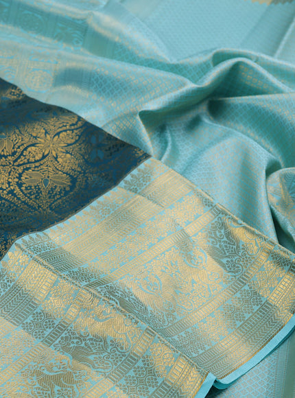 Pure kanchipuram silk saree peacock green and light blue with allover zari woven brocade weaves and long zari woven border