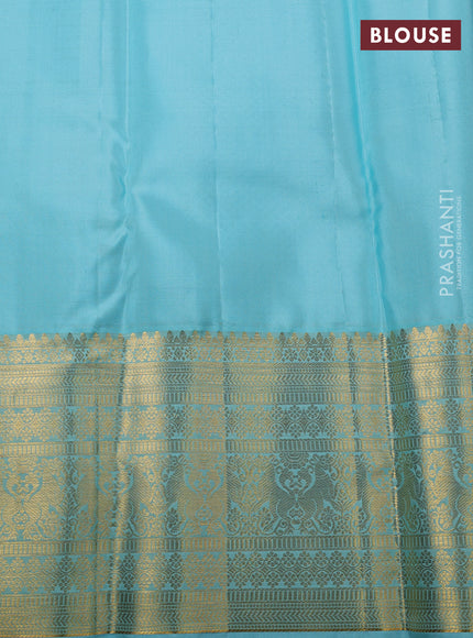 Pure kanchipuram silk saree peacock green and light blue with allover zari woven brocade weaves and long zari woven border