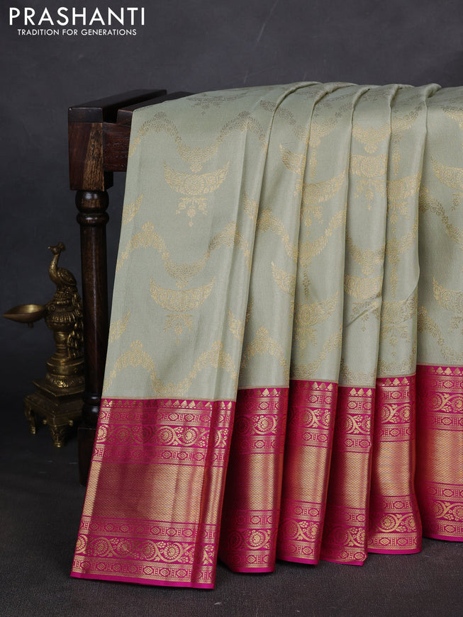 Pure kanchipuram silk saree pastel green and pink with allover zari woven brocade weaves and long zari woven border